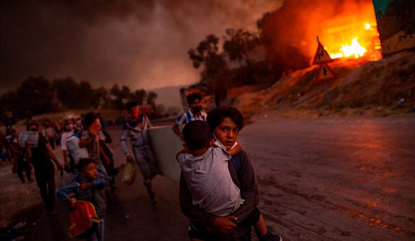 Foto von den vor dem Feuer von Moria fliehenden Kindern wird UNICEF-Foto des Jahres